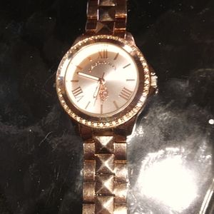 U.S. Polo rose gold plated watch. The band has some wear and needs a battery.